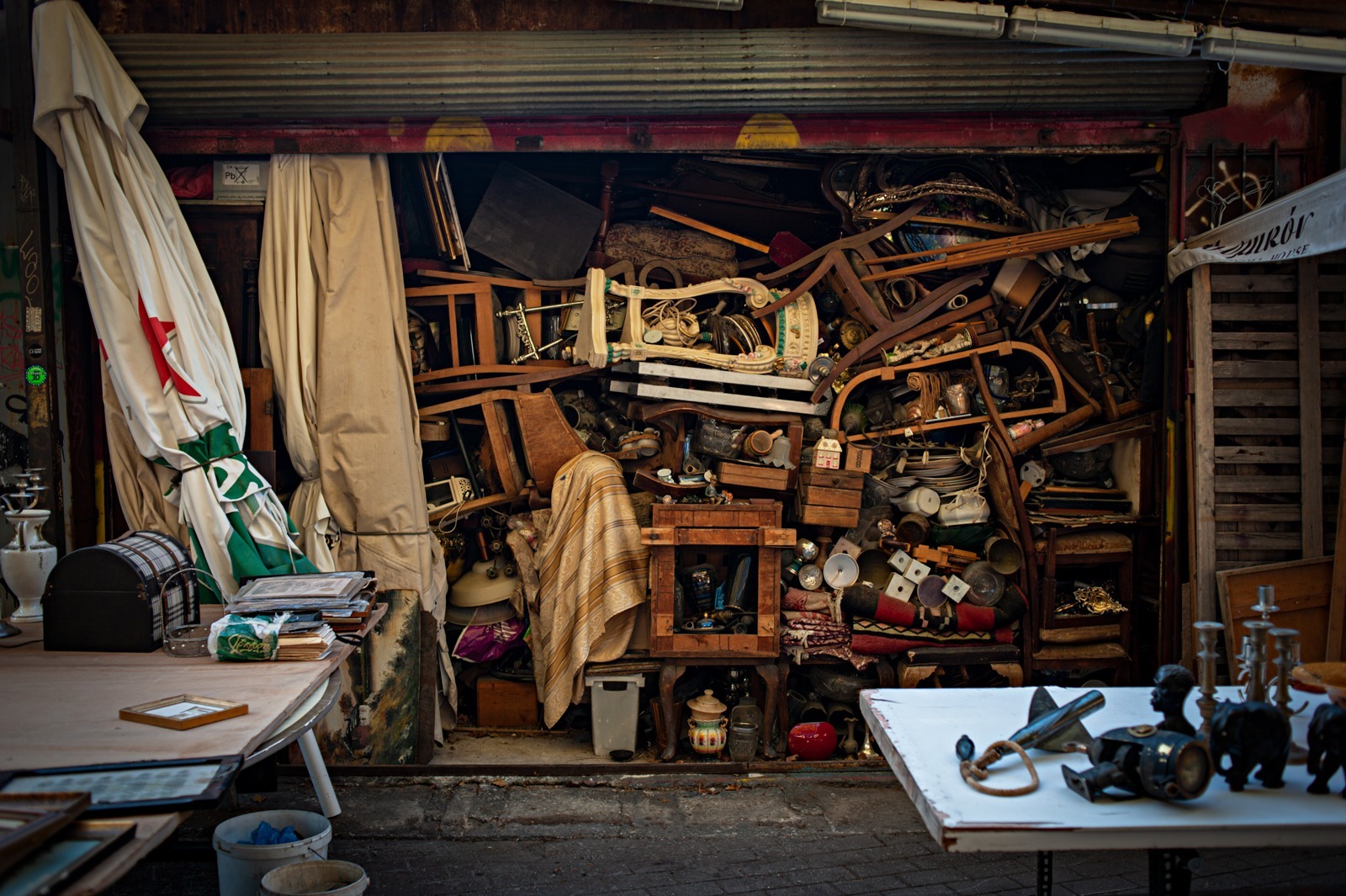 A crammed antique stall in the centre of Athens taken in the early evening
