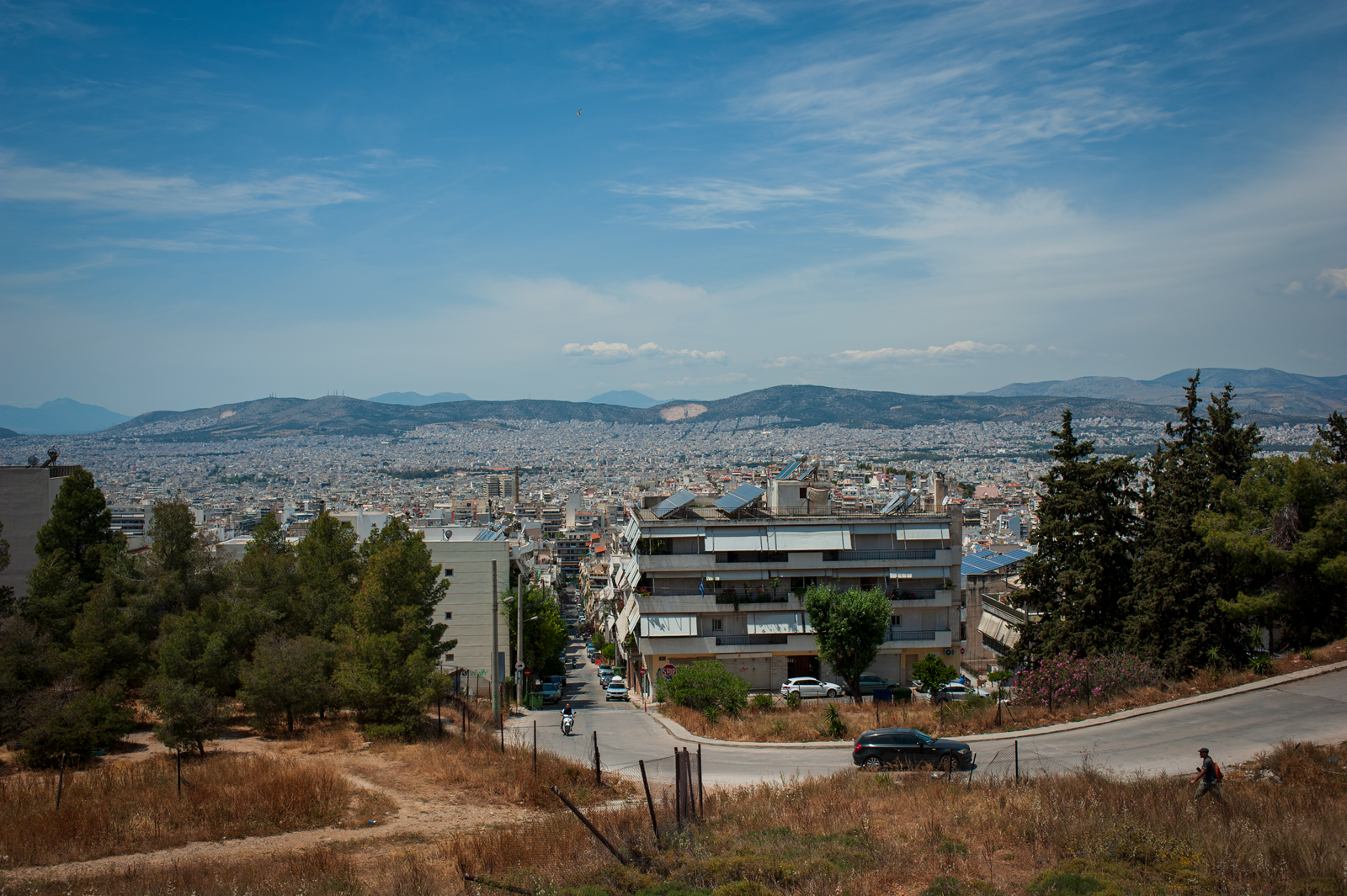 A cityscape looking over Athens on the way to Tourkovounia.