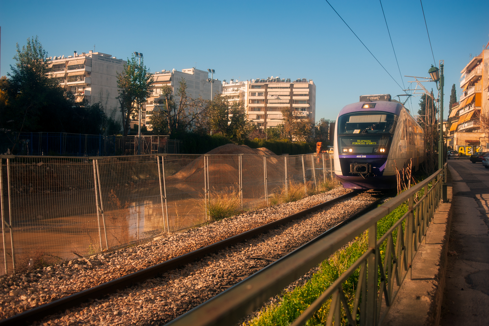 A train approaching on the railway track in Athens.
