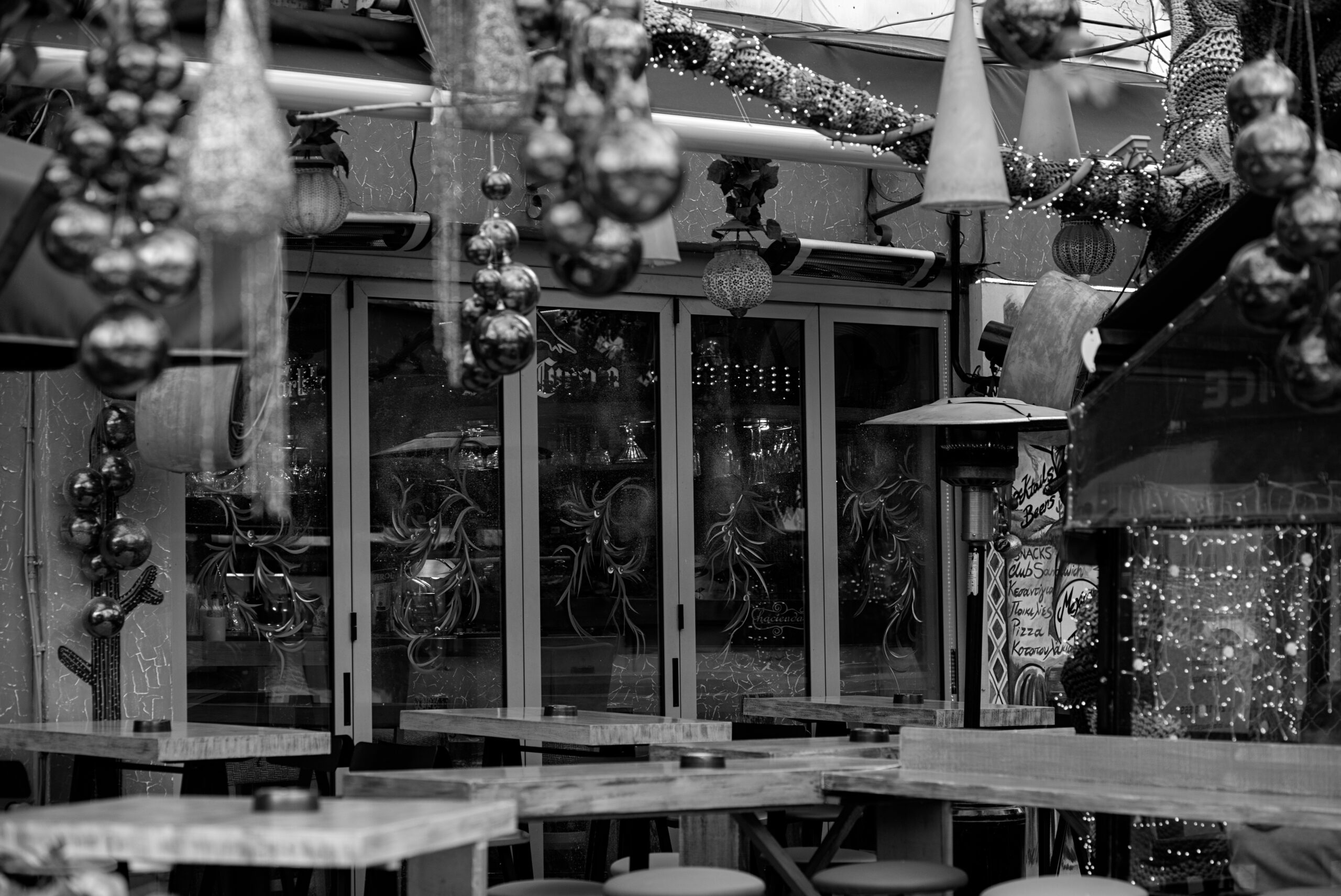 A bar in the centre of Athens photographed in black and white.