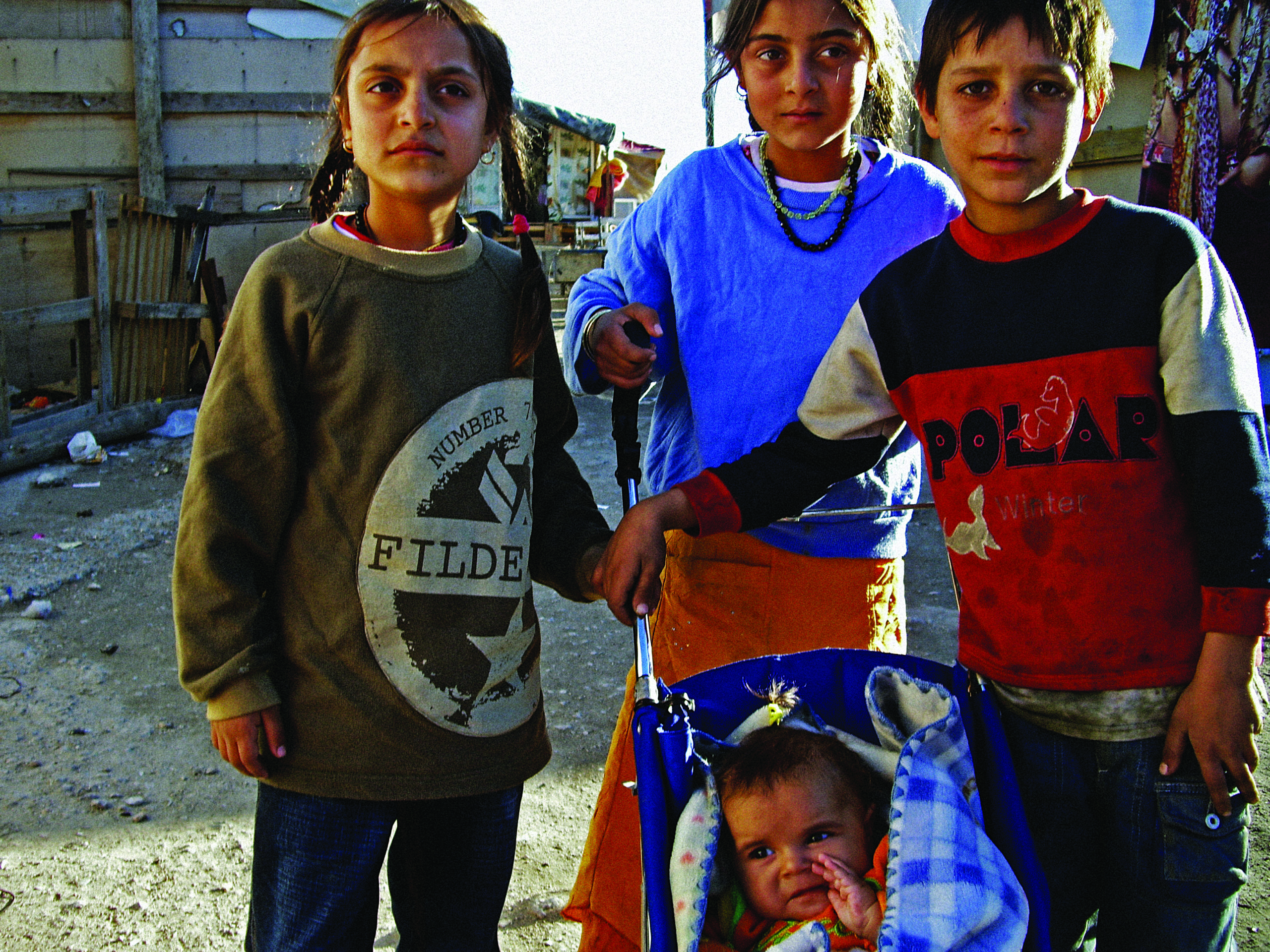 Friends at a Roma camp in Athens.