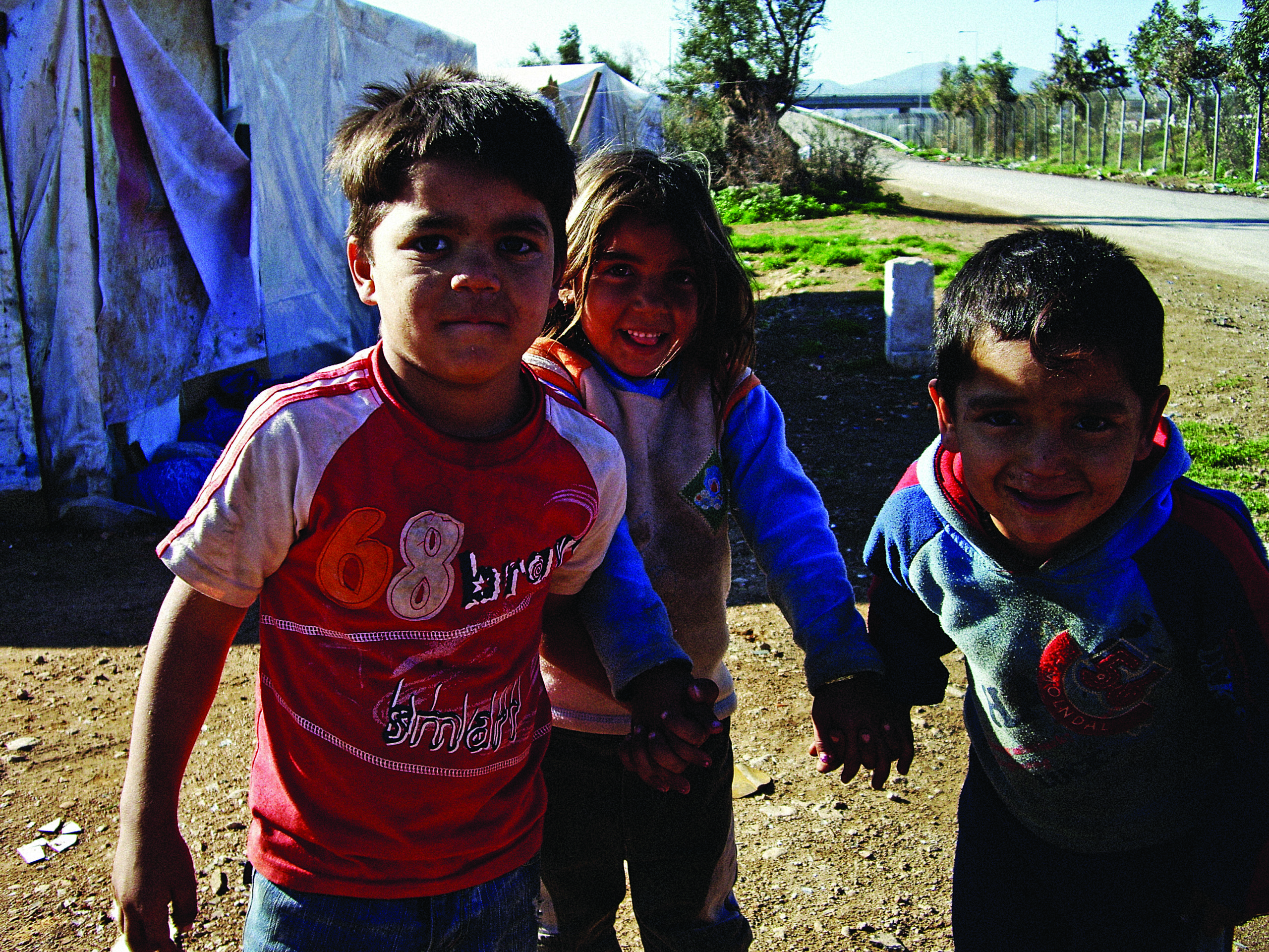 Home from school at a Roma camp in Athens.